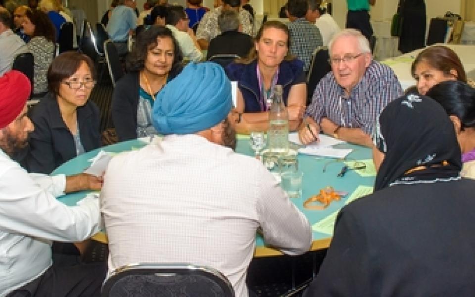 Diverse group sitting at one table