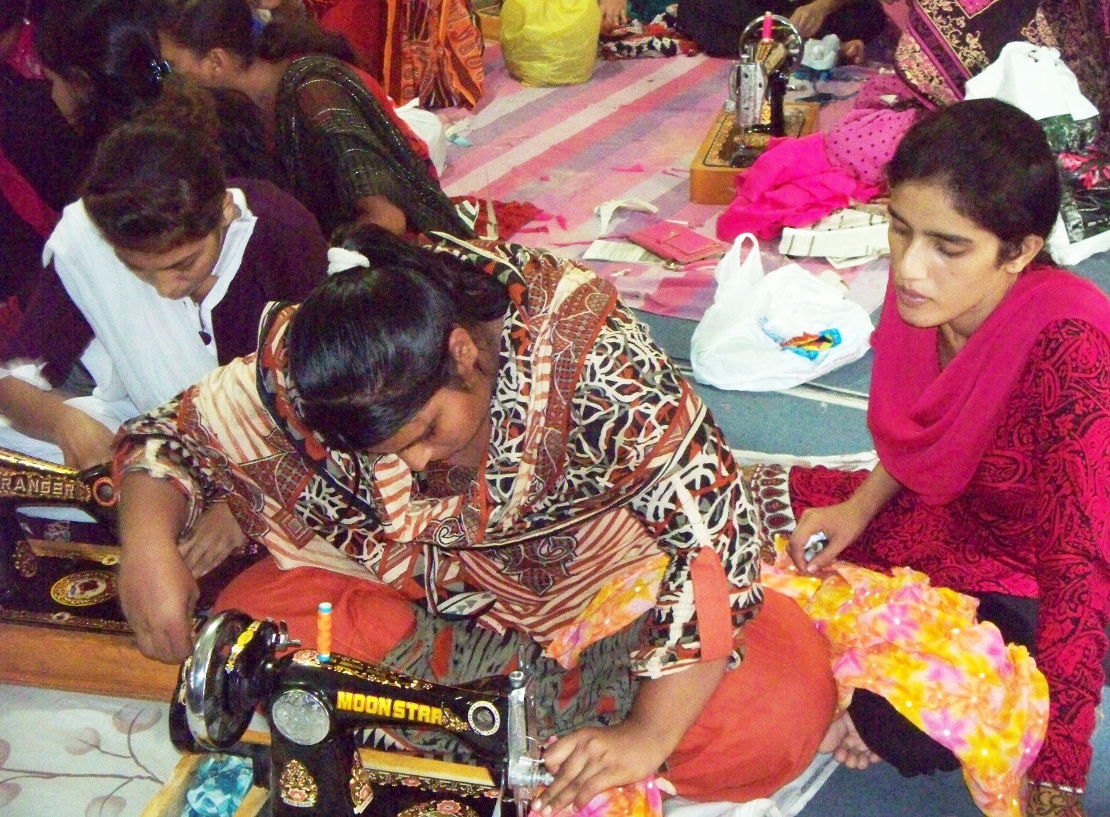 Trainees at the URI Vocational Sewing Centre